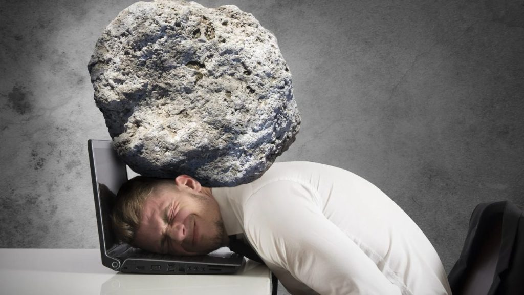 a-stressed-virtual-assistant-depicted-with-an-imaginary-boulder-on-their-head-symbolizing-the-pressure-and-workload-of-administrative-tasks