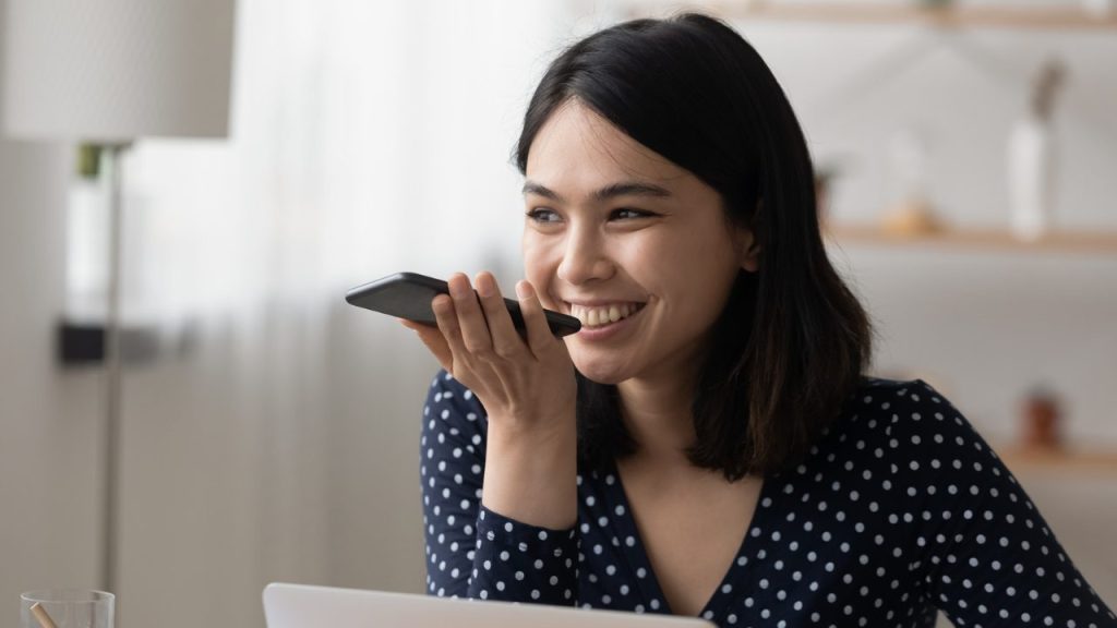 a-virtual-assistant-chatting-with-a-client-on-their-phone-providing-professional-support-remotely