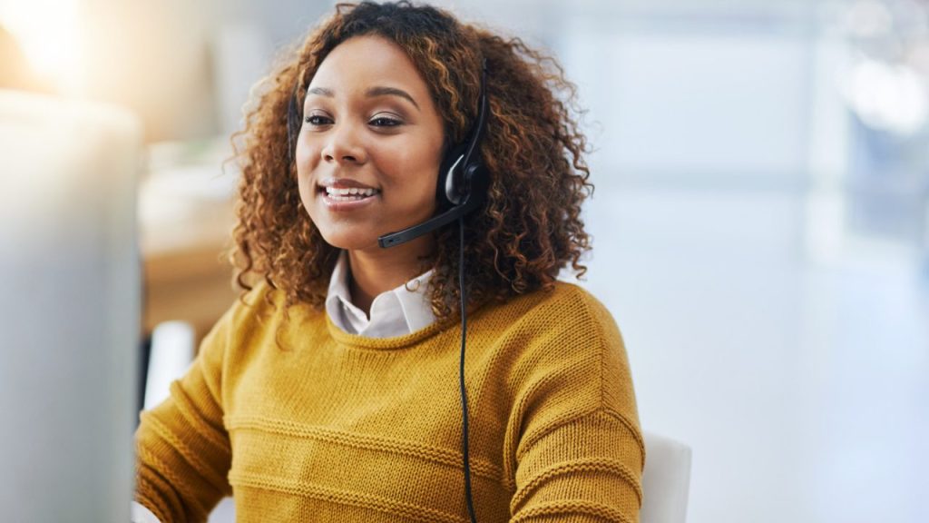 a-virtual-assistant-having-a-conversation-with-a-client-on-her-computer-providing-remote-administrative-support