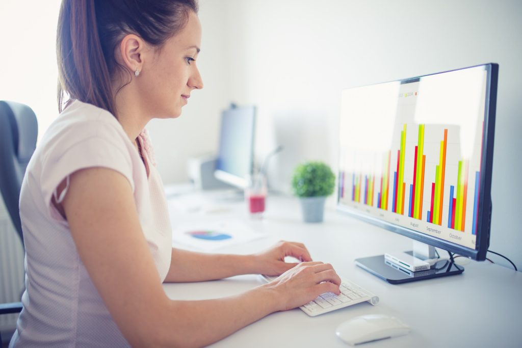 beautiful-business-lady-in-office-working-on-a-computer