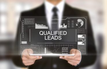 man-in-a-suit-using-an-ipad-for-virtual-lead-generation