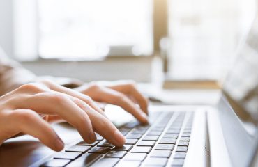 virtual-content-writer-working-on-laptop-and-typing