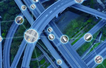 virtual-traffic-engineer-analyzing-traffic-on-a-busy-road-with-cars-trucks-and-bridges-in-the-background-with-traffic-signs